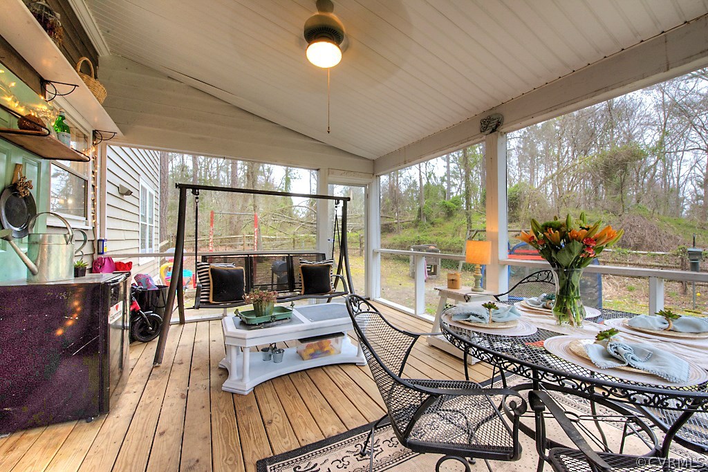 3919 Pebble Creek Road Midlothian, VA 23112 - Photo 35 of 46 a view of a patio with dining table and chairs