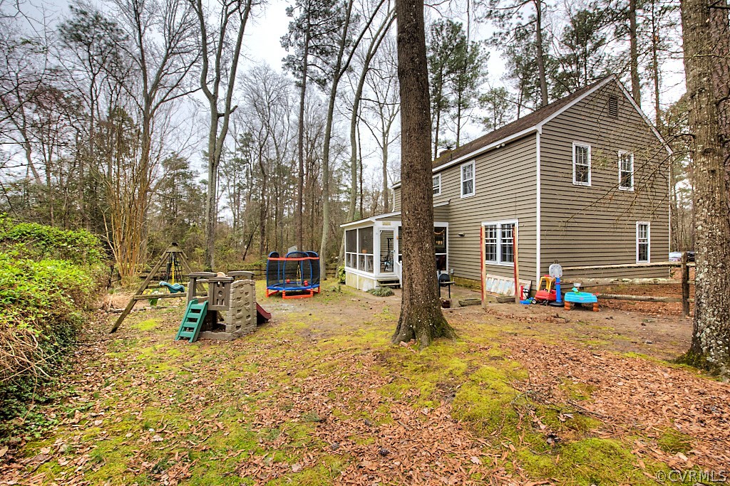 3919 Pebble Creek Road Midlothian, VA 23112 - Photo 38 of 46 a view of a small house with a patio