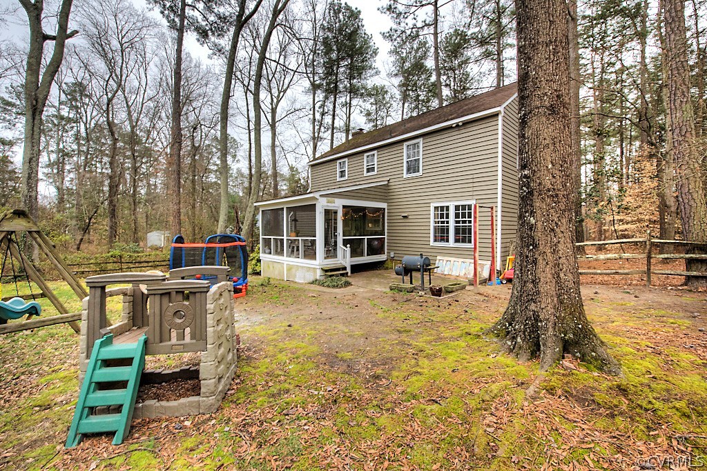 3919 Pebble Creek Road Midlothian, VA 23112 - Photo 39 of 46 a backyard of a house with table and chairs