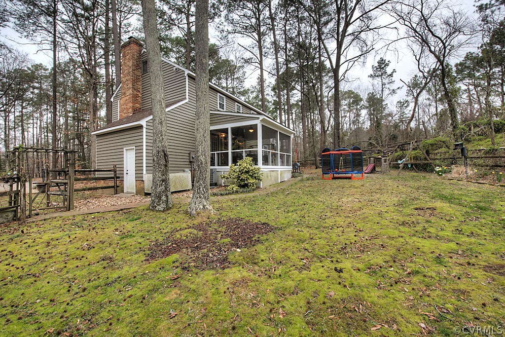 3919 Pebble Creek Road Midlothian, VA 23112 - Photo 41 of 46 a view of a house with backyard porch and sitting area