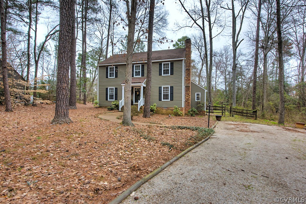 3919 Pebble Creek Road Midlothian, VA 23112 - Photo 44 of 46 a front view of a house with a yard