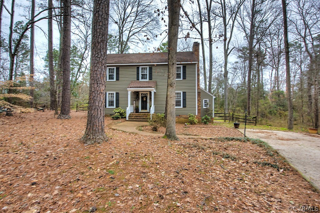 3919 Pebble Creek Road Midlothian, VA 23112 - Photo 45 of 46 a house with trees in front of it