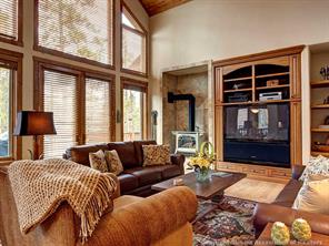 74 452nd Road, Unit COUNTY Breckenridge, CO 80424 - Photo 1 of 22 a bedroom with furniture and a window