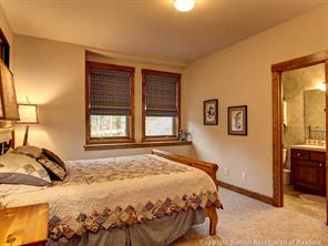 74 452nd Road, Unit COUNTY Breckenridge, CO 80424 - Photo 13 of 22 a bedroom with a bed and a window