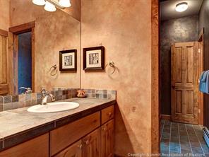 74 452nd Road, Unit COUNTY Breckenridge, CO 80424 - Photo 16 of 22 a bathroom with a sink and a mirror