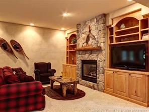 74 452nd Road, Unit COUNTY Breckenridge, CO 80424 - Photo 18 of 22 a living room with furniture and a fireplace