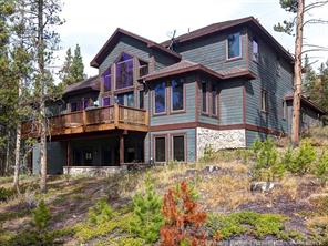 74 452nd Road, Unit COUNTY Breckenridge, CO 80424 - Photo 22 of 22 a front view of a house with a garden