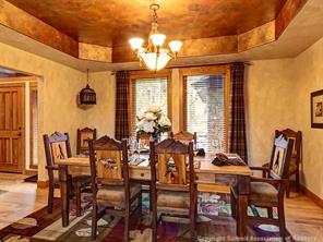 74 452nd Road, Unit COUNTY Breckenridge, CO 80424 - Photo 7 of 22 a view of a dining room with furniture and wooden floor