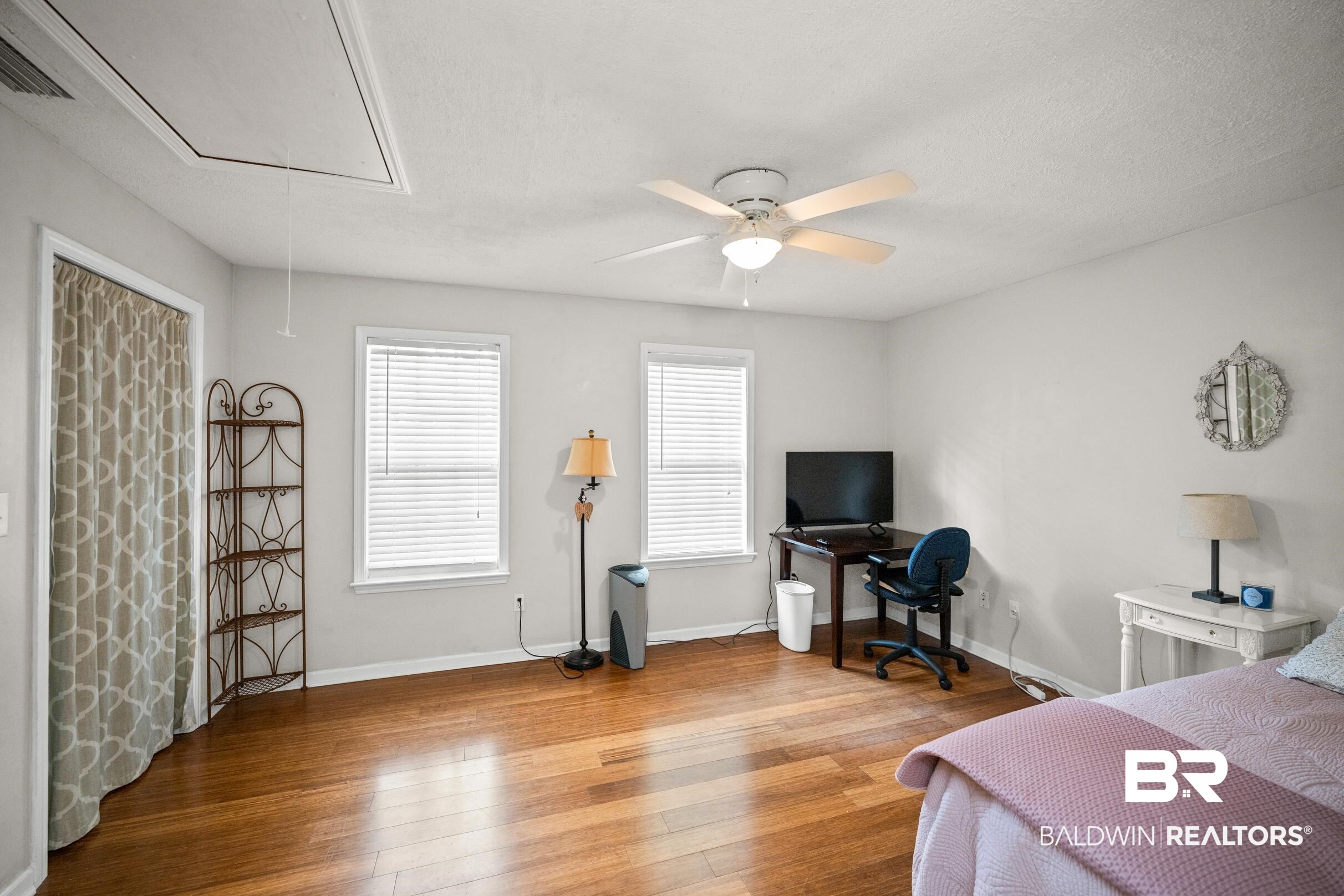 123 Dunbar Loop Daphne, AL 36526 - Photo 24 of 33 Bedroom with attic access, light wood-style flooring, an office area, and ceiling fan