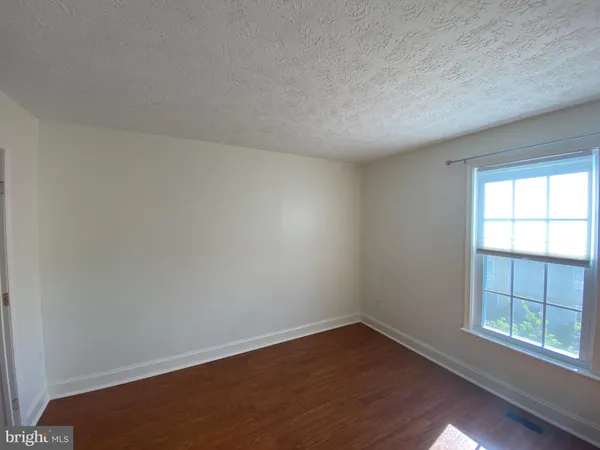 a view of a backyard with garden