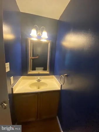 a view of an empty room and a windows