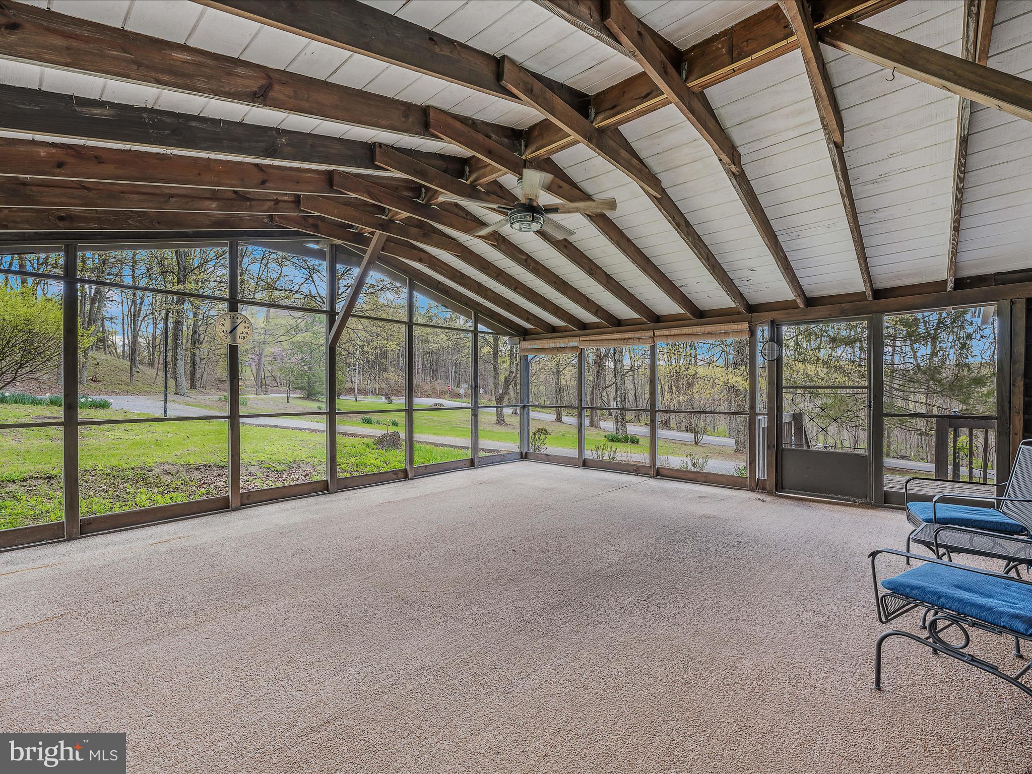 56 Sir Johns Run Road Berkeley Springs, WV 25411 - Photo 18 of 37 Screened Porch