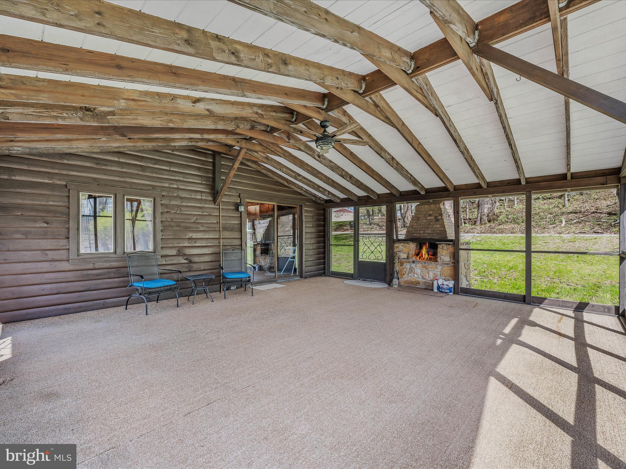 56 Sir Johns Run Road Berkeley Springs, WV 25411 - Photo 20 of 37 Screened Porch
