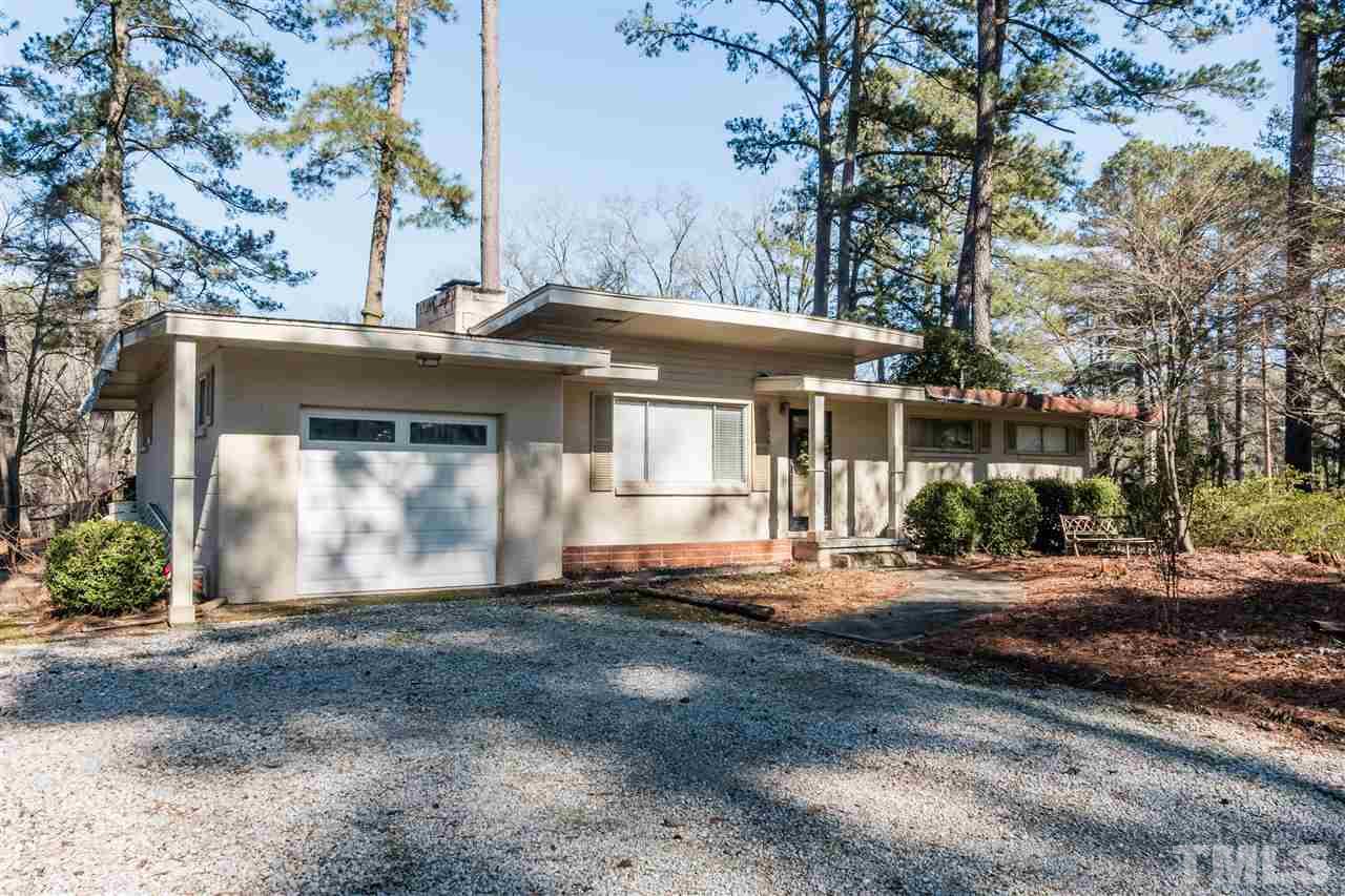 1016 Legend Road Raleigh, NC 27603 - Photo 1 of 21 a front view of a house with a yard