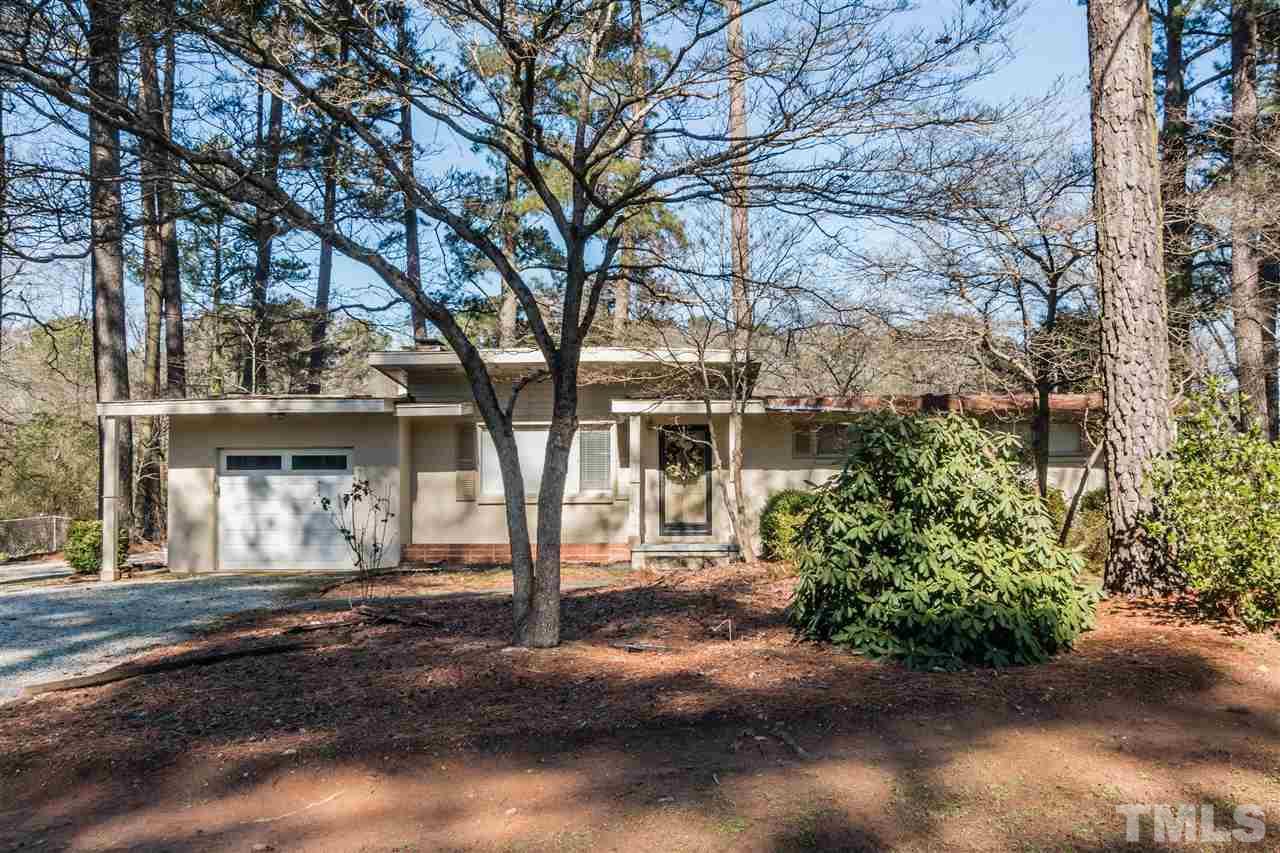 1016 Legend Road Raleigh, NC 27603 - Photo 21 of 21 a front view of a house with a garden