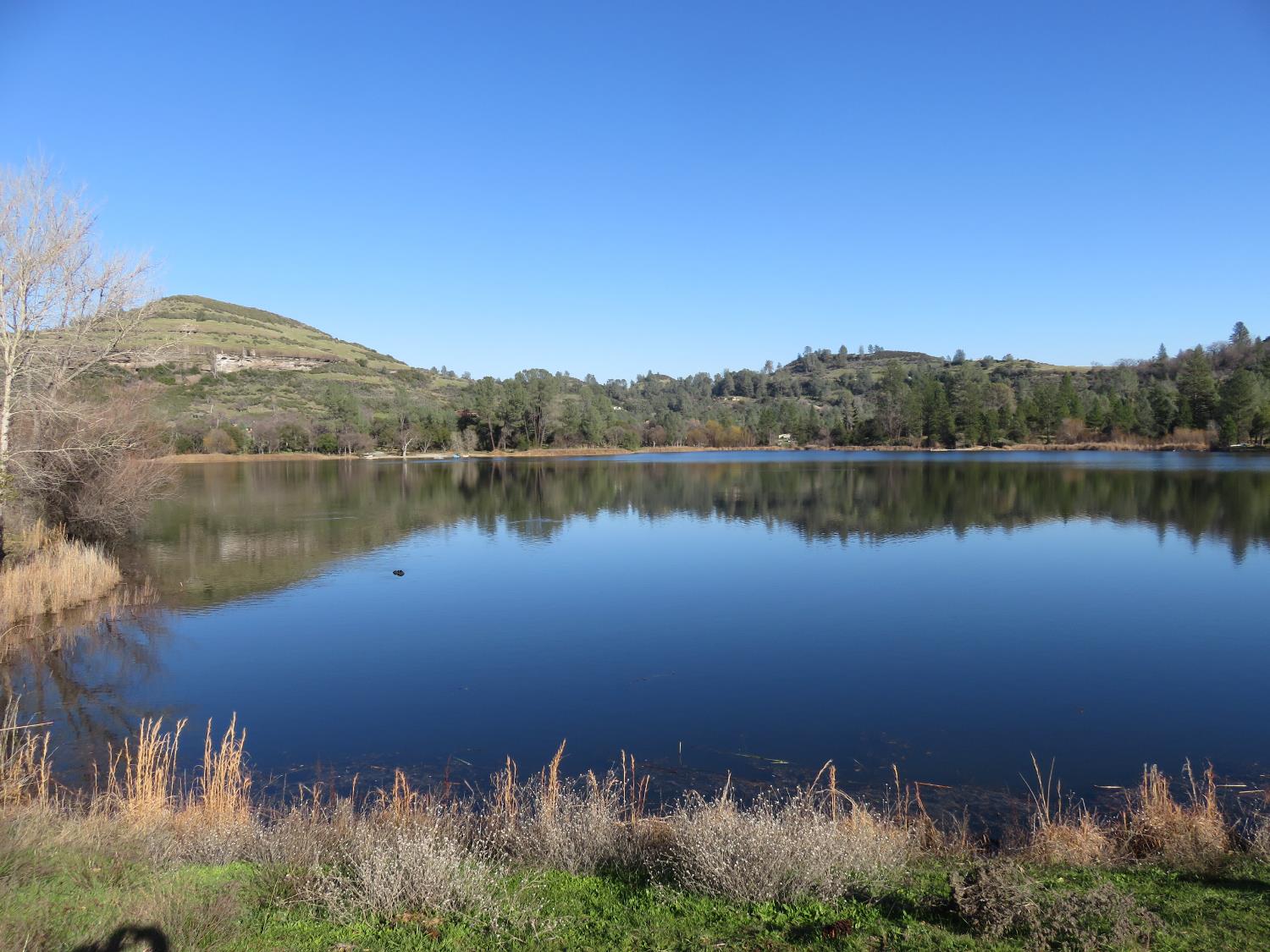 0 White Rock Road Mountain Ranch, CA 95246 - Photo 26 of 37 a view of a lake with a mountain in the background