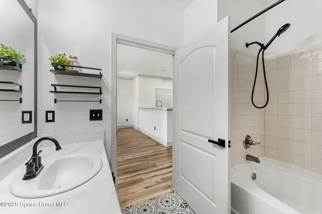 a bathroom with a sink and a bathtub