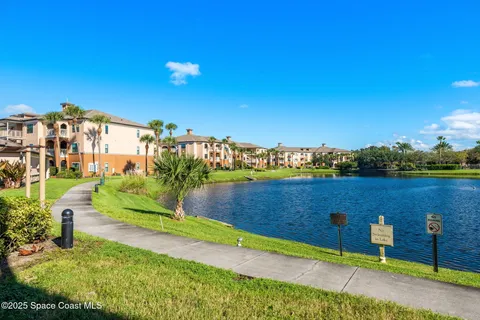 a view of a lake with a big yard