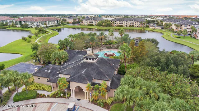 an aerial view of a city with lake view