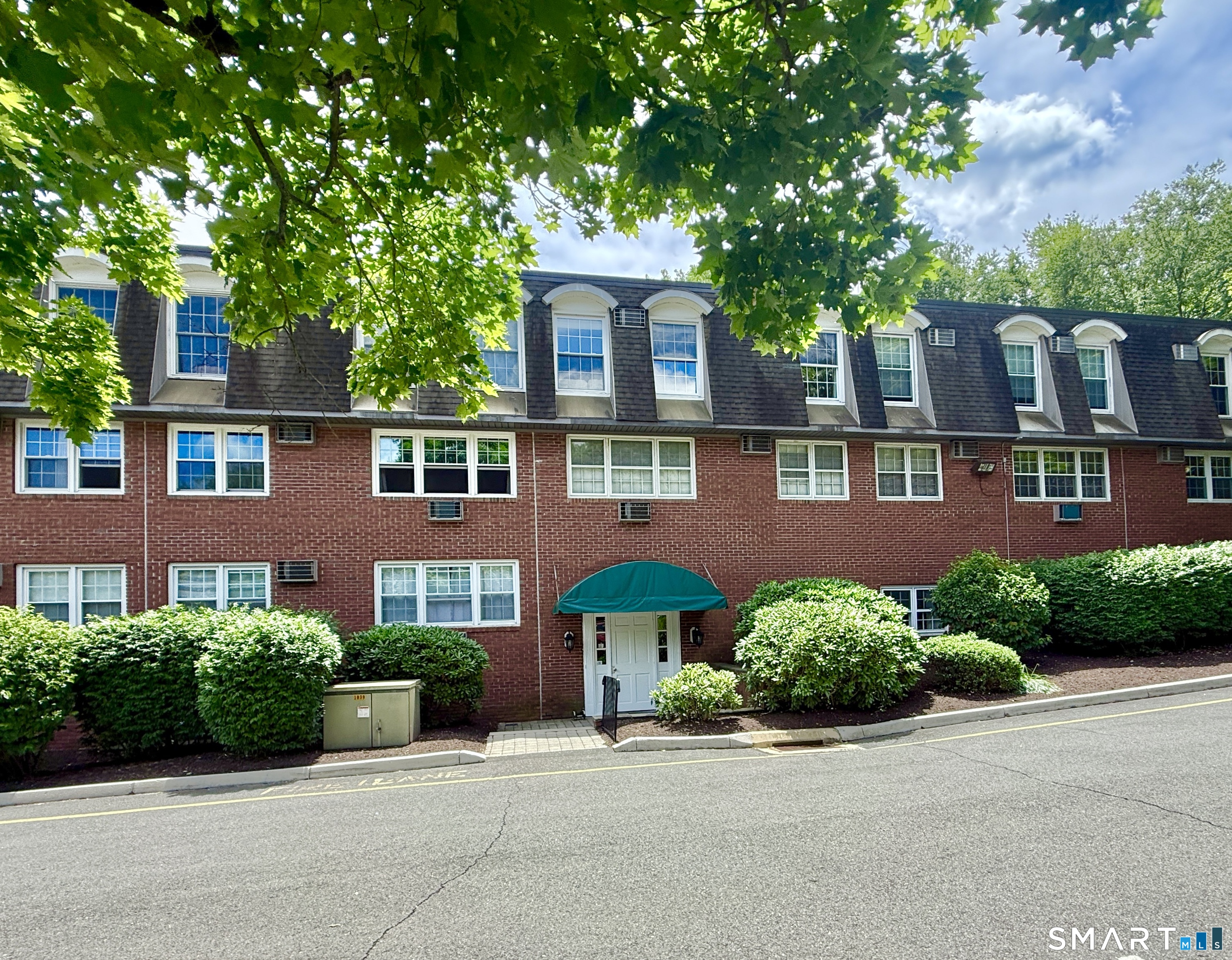34 A Padanaram Road, Unit 127 Danbury, CT 06811 - Photo 11 of 13 front view of a house