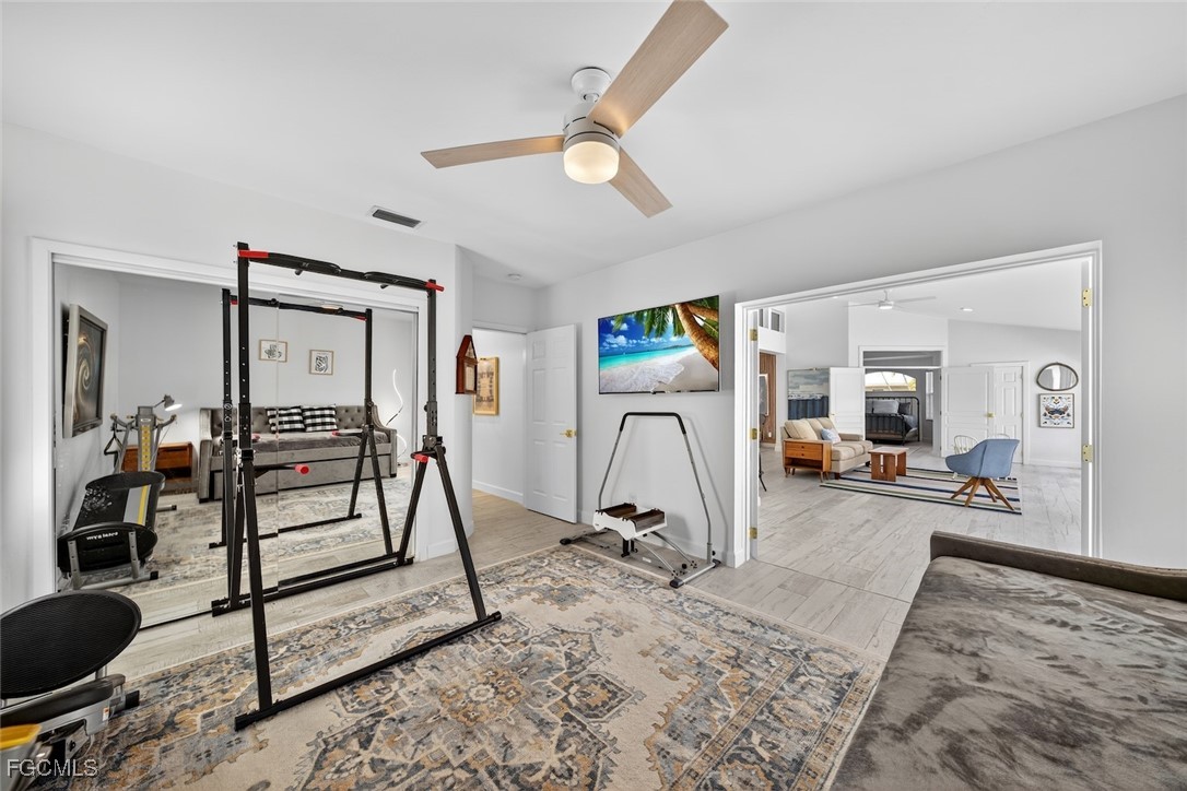 13570 Harbour Ridge Drive Fort Myers, FL 33908 - Photo 33 of 50 a view of a room with gym equipment