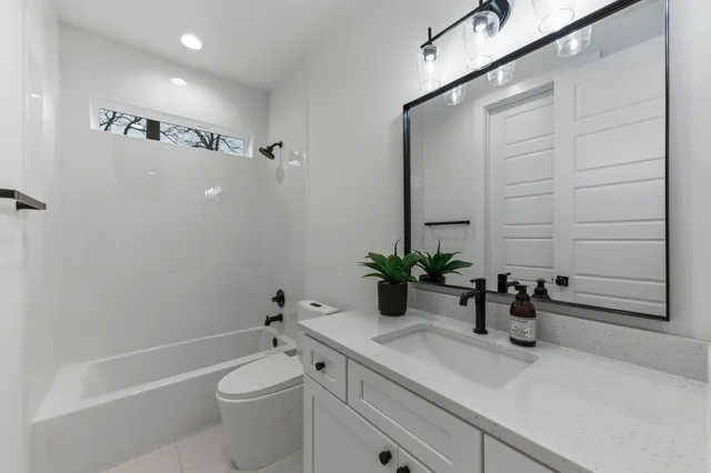 a view of a house with a door and wooden walls