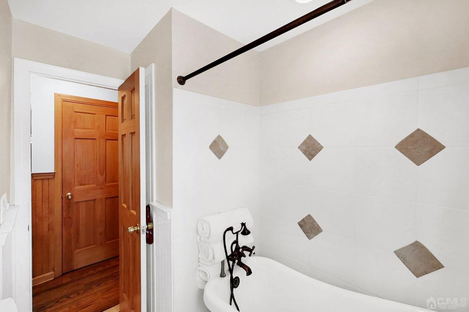 137 Kimberly Road Colonia, NJ 07067 - Photo 18 of 39 a bathroom with a shower