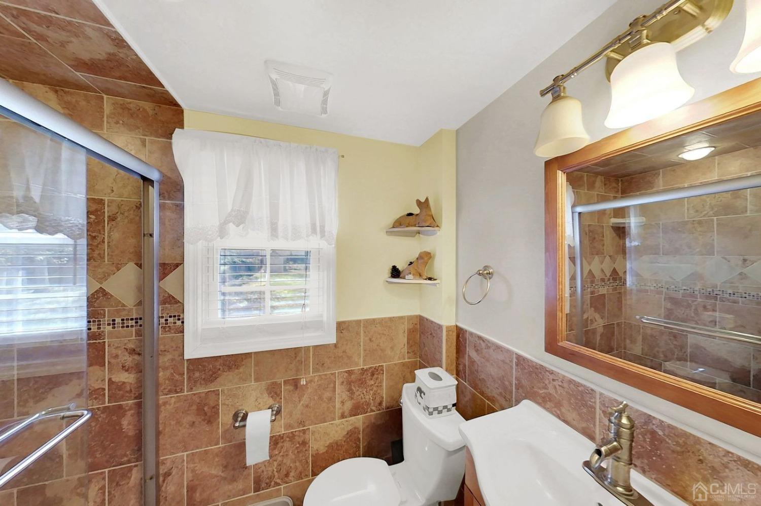 137 Kimberly Road Colonia, NJ 07067 - Photo 28 of 39 a bathroom with a bathtub and shower