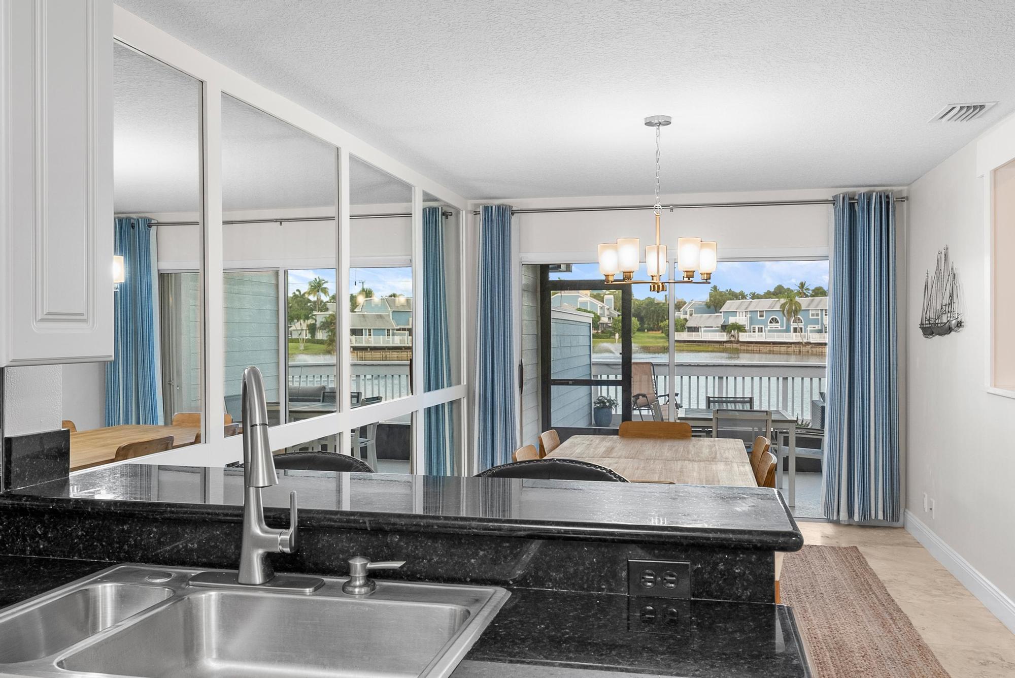 1219 Ocean Dunes Circle Jupiter, FL 33477 - Photo 28 of 35 a room with pool table and windows