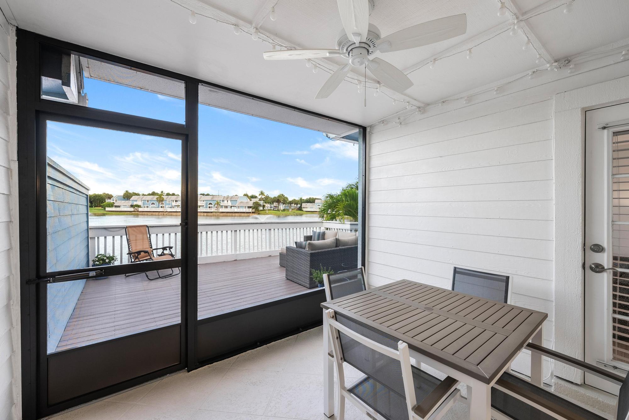 1219 Ocean Dunes Circle Jupiter, FL 33477 - Photo 30 of 35 a view of a dining room with furniture window and outside view