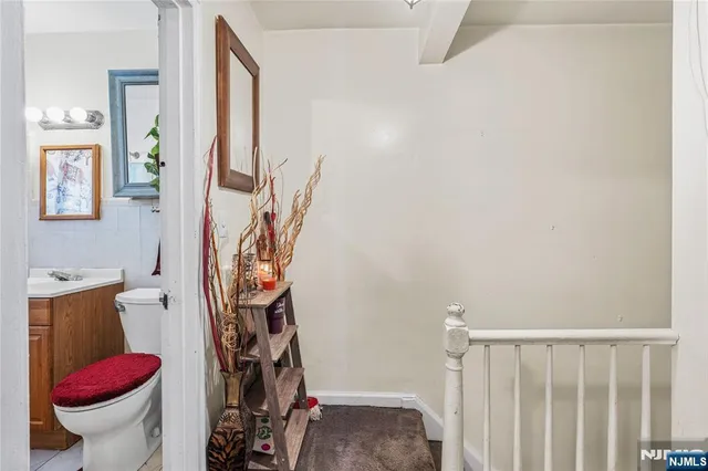 a view of a hallway with closet