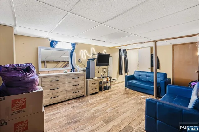 a room with furniture and a dresser