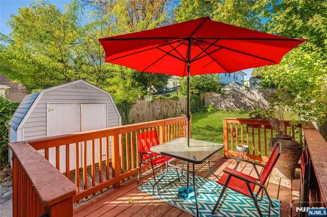 a view of sitting area with furniture and backyard