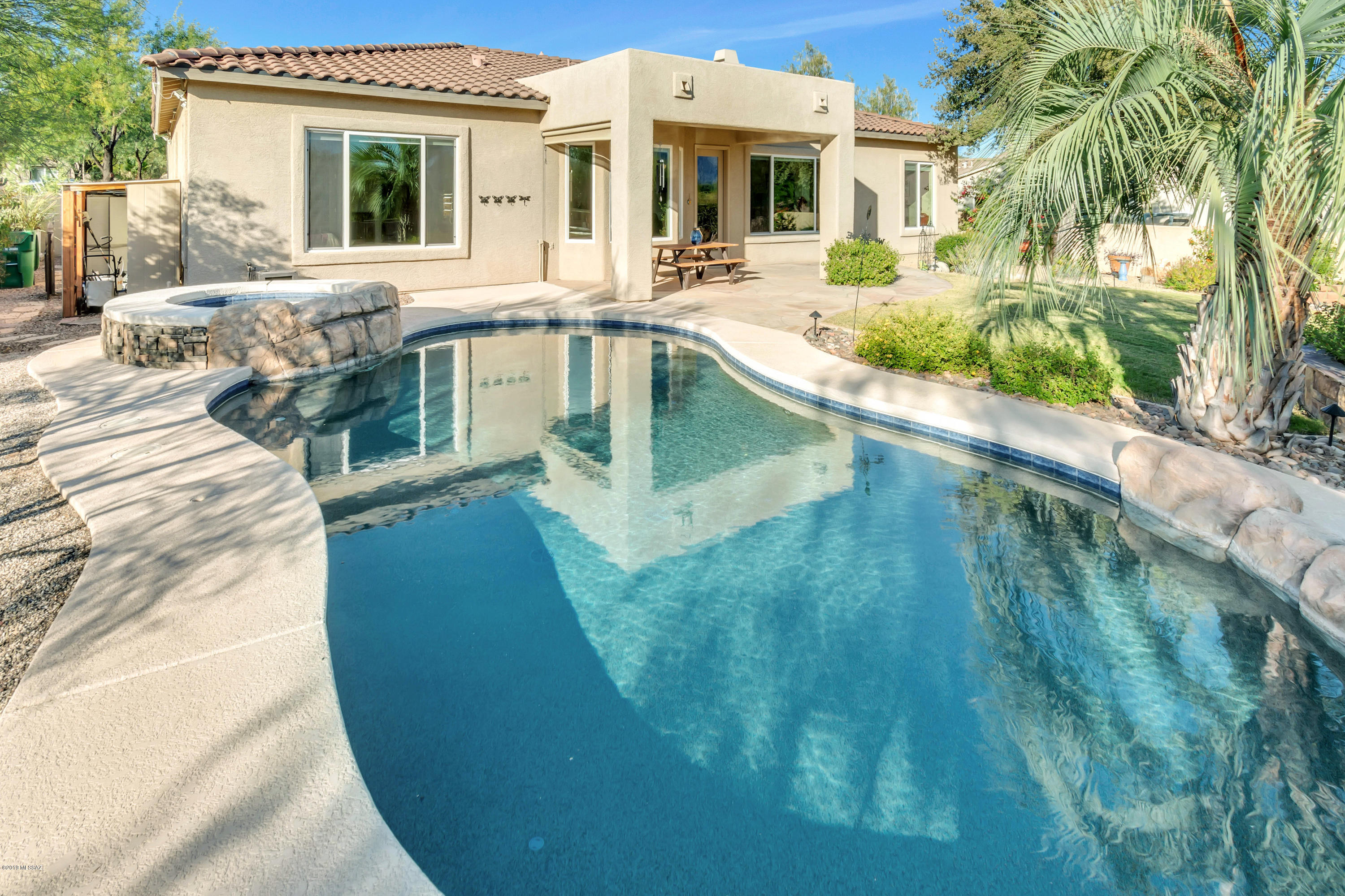 12682 North Spirit Mountain Road Oro Valley, AZ 85755 - Photo 29 of 40 a view of a house with a swimming pool