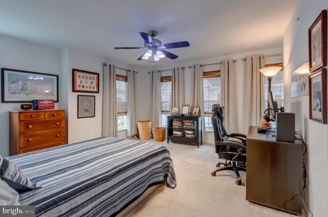 a bedroom with a bed and furniture