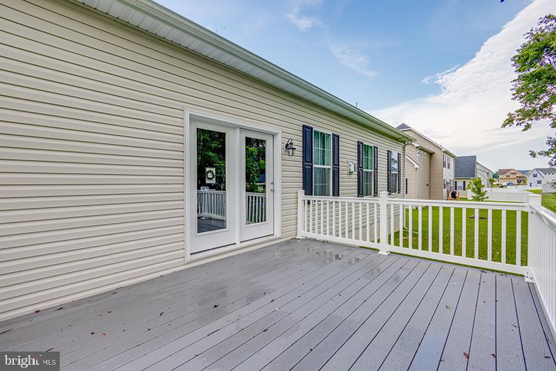 38 High Ridge Road Felton, DE 19943 - Photo 11 of 51 a view of a wooden deck
