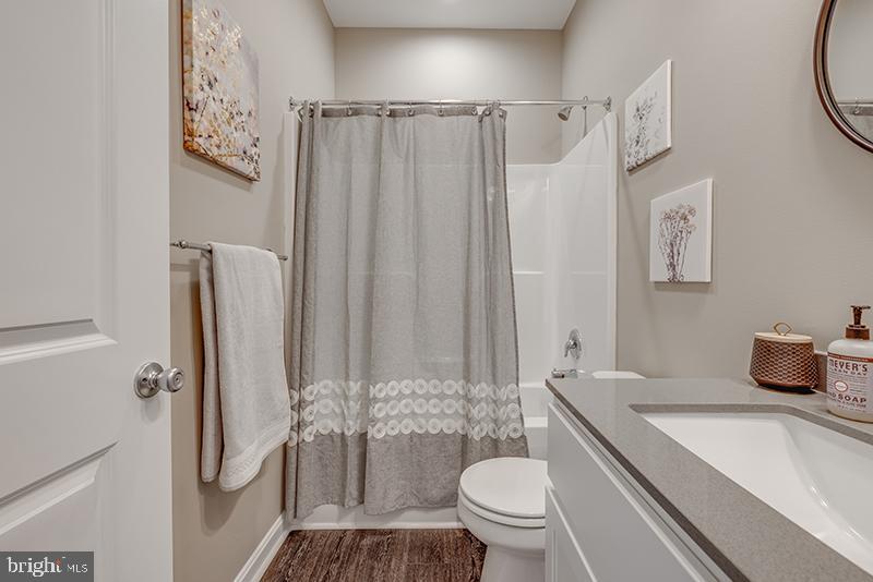 38 High Ridge Road Felton, DE 19943 - Photo 20 of 51 a bathroom with a sink toilet and shower