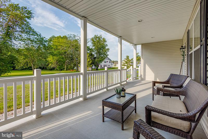 38 High Ridge Road Felton, DE 19943 - Photo 5 of 51 a balcony with wooden floor and outdoor seating