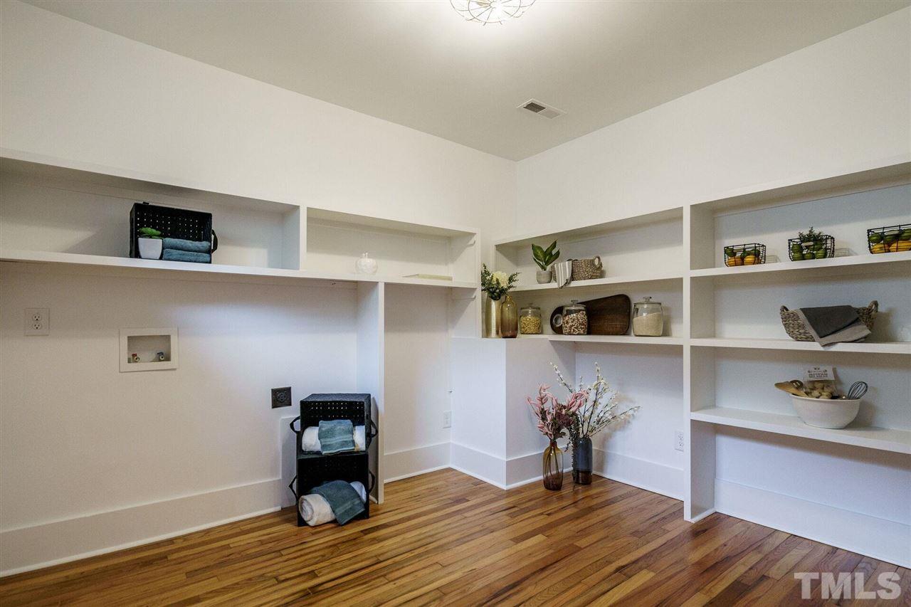1619 Lorraine Road Raleigh, NC 27607 - Photo 14 of 30 This room is sound-proofed with rock wool to minimize any sound from the washer and dryer. This room offers plenty of space for food and appliance storage...a great place for that big Instapot or Air Fryer!