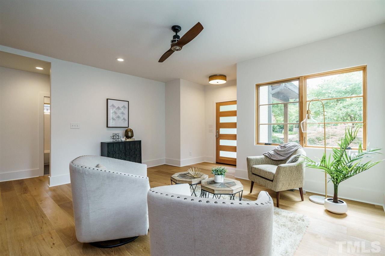 1619 Lorraine Road Raleigh, NC 27607 - Photo 3 of 30 The Open-Plan of this highly efficient home offers many options for use of the Main Floor. Custom White-Oak flooring, Coastal-Rated Custom Marvin Windows.