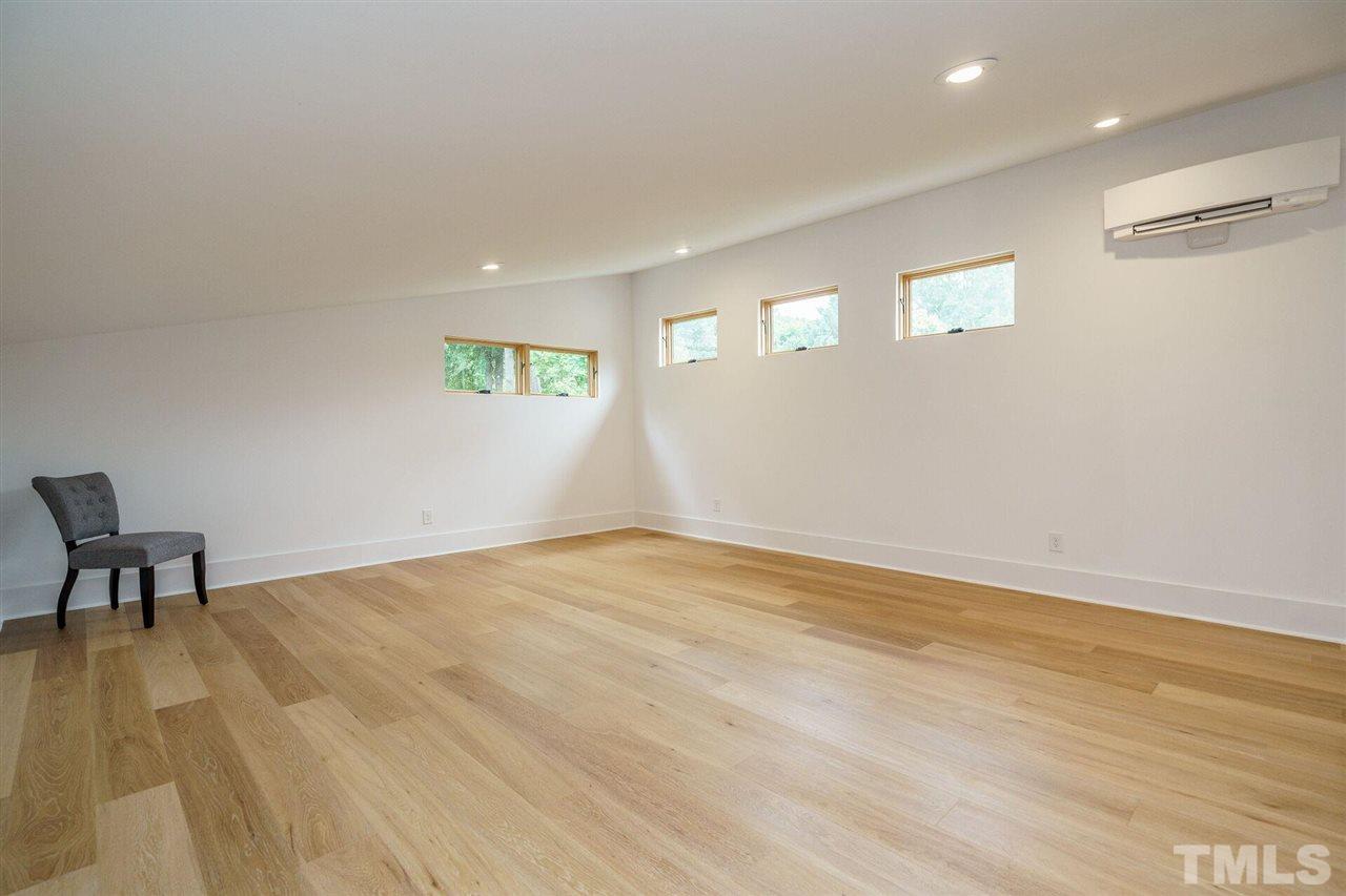 1619 Lorraine Road Raleigh, NC 27607 - Photo 21 of 30 Playroom, Media Room, Home Office...this rooms offers options! The Second Floor is climatized with highly efficient, easy-to zone, sleek, programmable state-of-the art Daikin Mini-Split Units. Not having ductwork increases efficiency by up to 40%!!