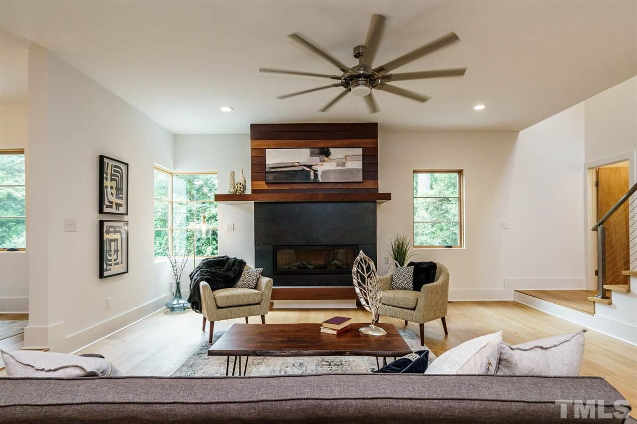 1619 Lorraine Road Raleigh, NC 27607 - Photo 7 of 30 From a perfect home chef's Kitchen into the Family Room....an entertainer's dream.