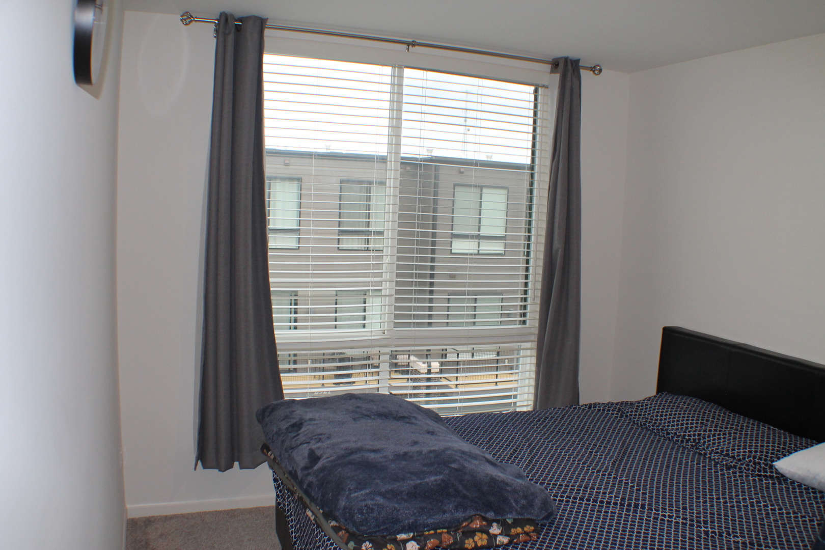 2323 Prestige Place, Unit 1 Schaumburg, IL 60173 - Photo 14 of 17 a bedroom with a bed and a window