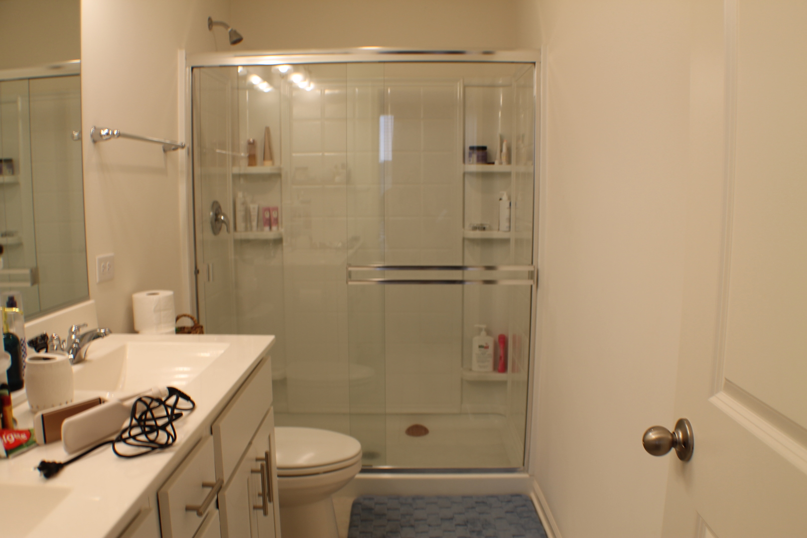 2323 Prestige Place, Unit 1 Schaumburg, IL 60173 - Photo 17 of 17 a bathroom with a sink a toilet and shower