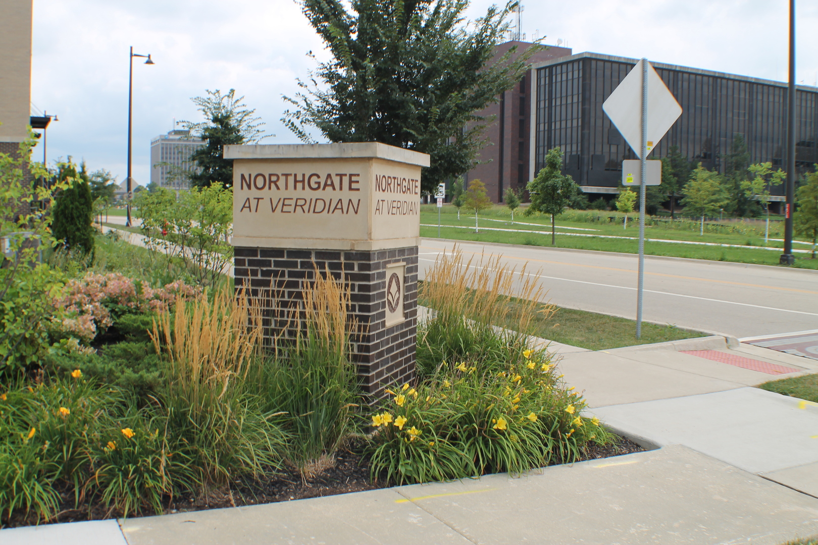 2323 Prestige Place, Unit 1 Schaumburg, IL 60173 - Photo 3 of 17 a sign on the side of a building