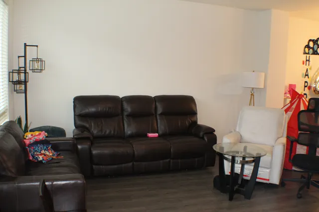a living room with furniture and a couch