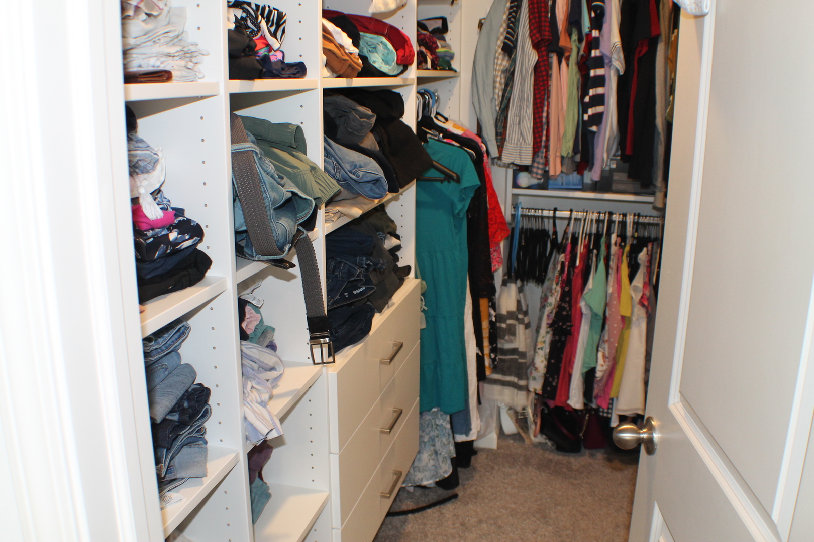 2323 Prestige Place, Unit 1 Schaumburg, IL 60173 - Photo 9 of 17 a view of walk in closet with clothes and shoes