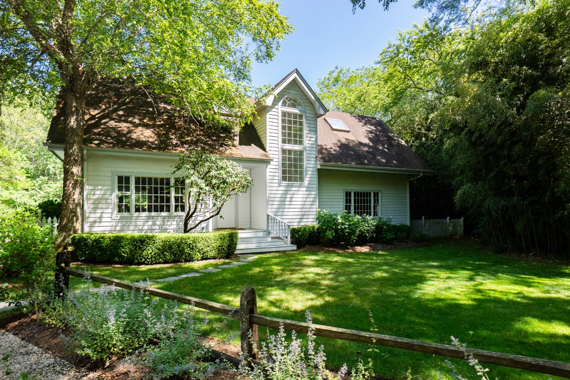 29 Meadows East Bridgehampton, NY 11932 - Photo 1 of 15 a view of a house with yard and a garden