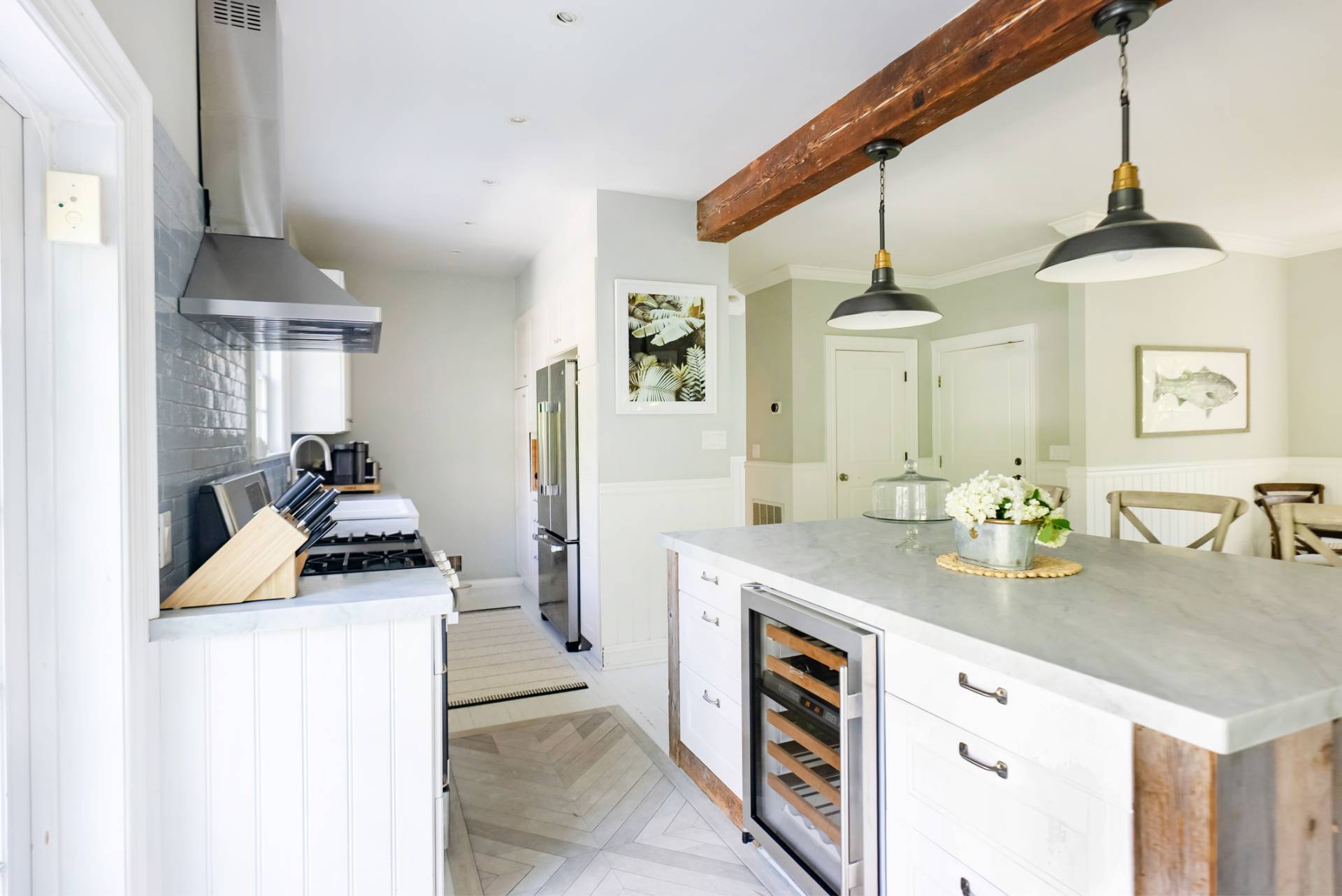 29 Meadows East Bridgehampton, NY 11932 - Photo 3 of 15 a kitchen with a sink stove and cabinets