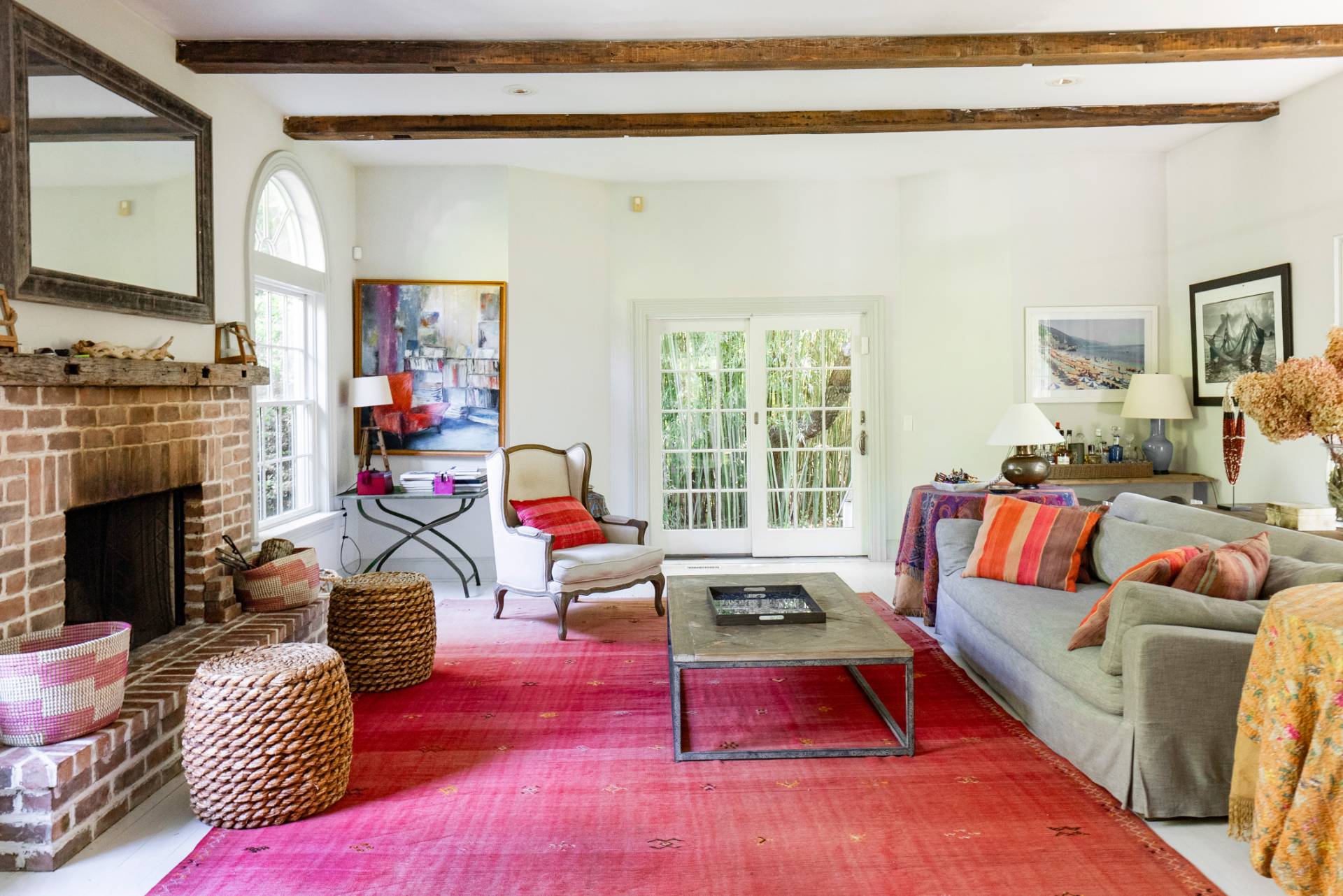 29 Meadows East Bridgehampton, NY 11932 - Photo 5 of 15 a living room with furniture a rug and a fireplace
